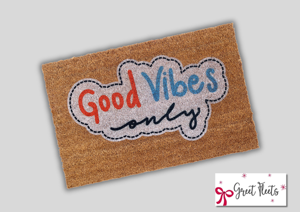 Good Vibes Only doormat with colorful lettering on a natural coir mat